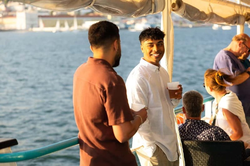 Lisbon: Sunset Boat Tour with Music and Drinks - Music, dancing, and the onboard mood