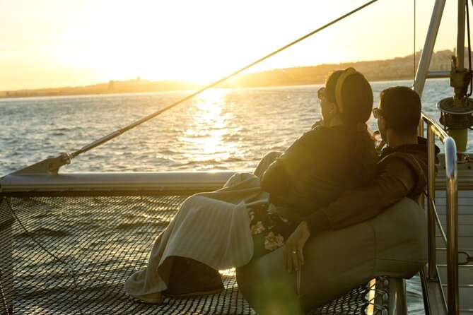 Lisbon: Sunset Catamaran Boat Tour with Music and Drinks - What the music adds to the experience