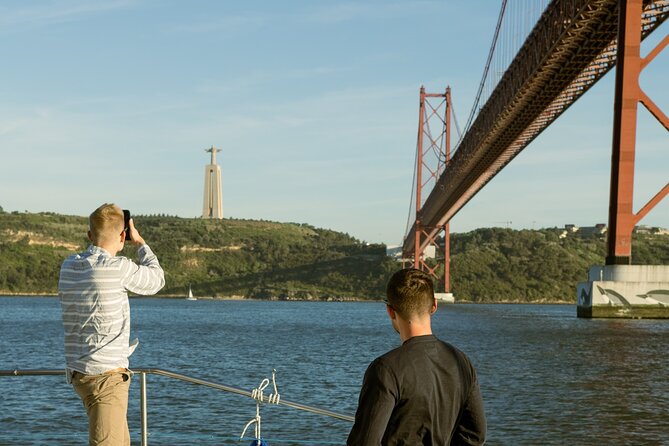 Lisbon: Sunset Catamaran Boat Tour with Music and Drinks - Choosing between the nets and the covered deck