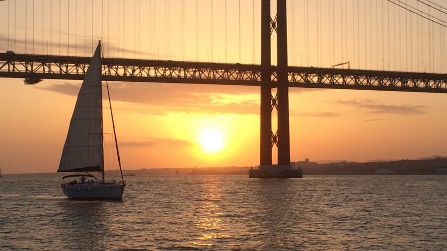 Lisbon: Sunset Cruise with Drinks - Time Out Market, Bairro Alto, and Commerce Square from the river