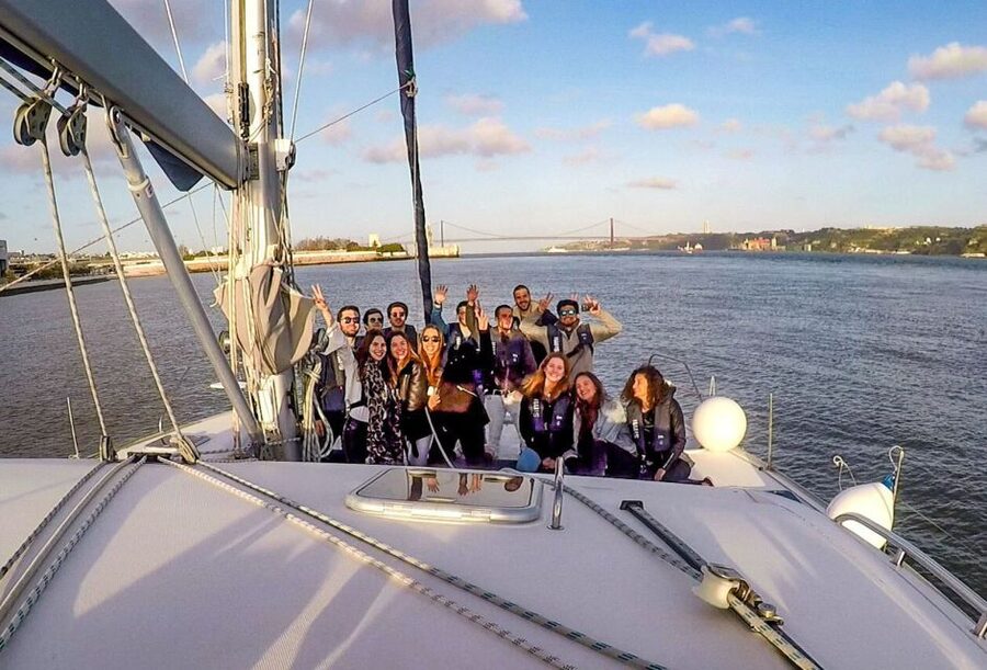 Lisbon: Sunset Cruise With Drinks on Spacious Yacht - Turning beneath the bridge