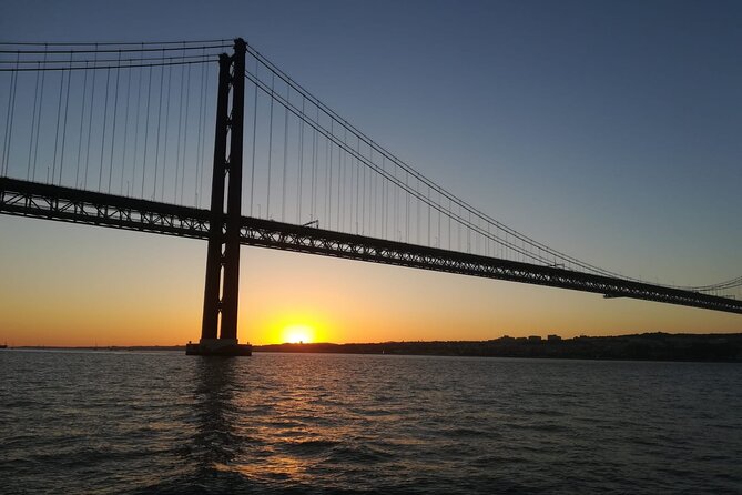 Lisbon: Sunset Sailing with Portuguese Wine and History - Sailing west toward Belém