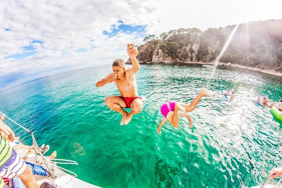 Lloret de Mar: Catamaran Sailing Cruise with BBQ and Drinks - Beer, sangria, soft drinks, and the return-party mood