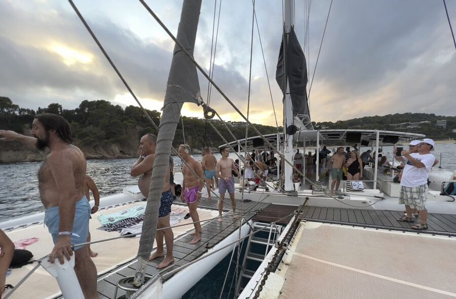 Lloret de Mar: Sunset Catamaran Cruise with DJ and Drinks - Practical packing and boat etiquette