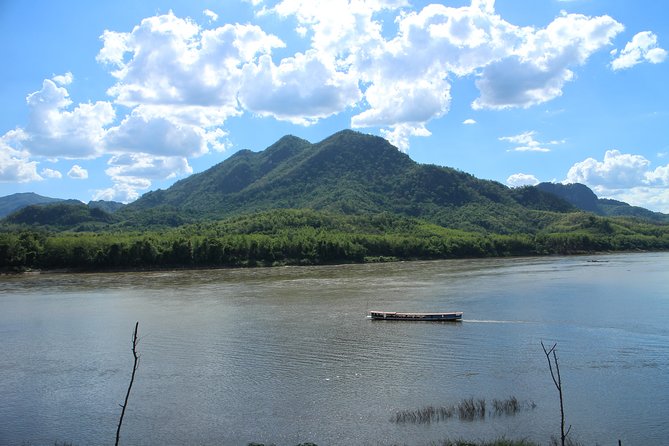 Luang Prabang: Cruise to Pak Ou Caves & Kuang Si Waterfalls - The Hmong village stop on the return