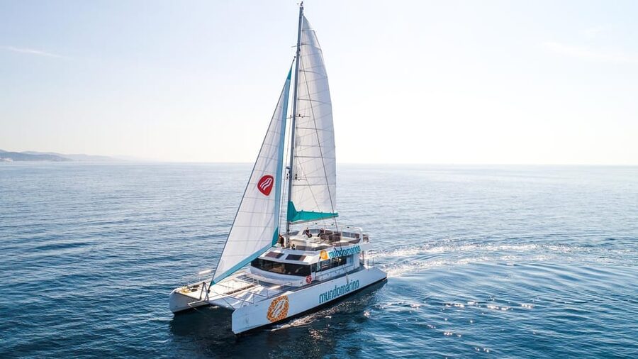 Malaga: Catamaran Sailing Cruise with Swimming & Optional DJ - Leaving Malaga from the pier