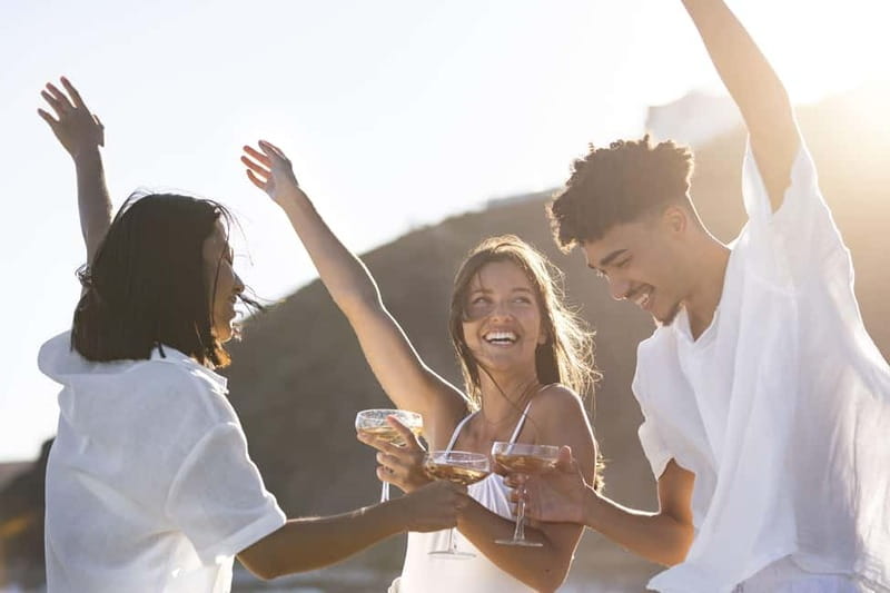 Malaga: Catamaran Sunset or Night Cruise w/ Live DJ & Drink - Leaving Malaga Port with cava in hand