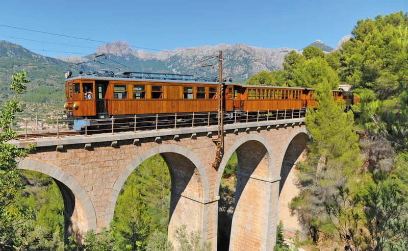Mallorca: Full-Day Island Tour by Train, Tram, and Boat - Cuber and Gorg Blau Lakes: a quiet mountain opening