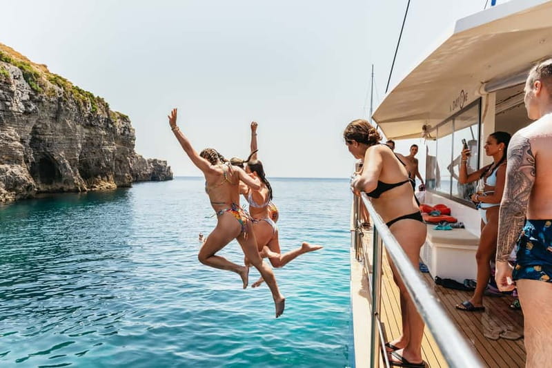 Malta: Blue Lagoon, Beaches & Bays Trip by Catamaran - Anchor Bay and Popeye’s Village