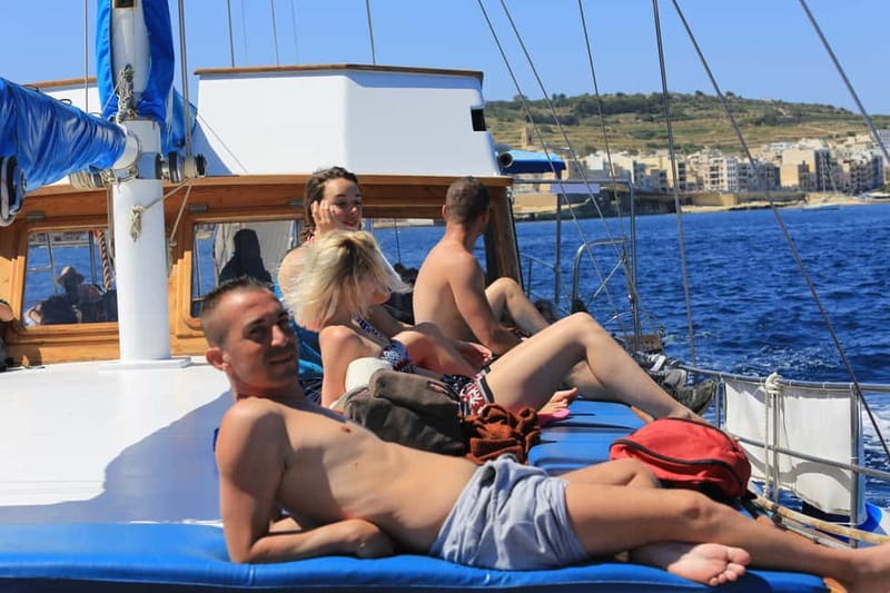 Malta: Gozo, Comino Island and Blue Lagoon Cruise - Swimming from the boat at the Blue Lagoon