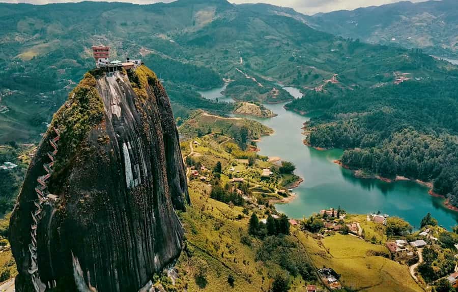 Medellin: Guatapé Day Trip & Boat to Pablo Escobar's Estate - Starting in El Poblado and riding the themed bus