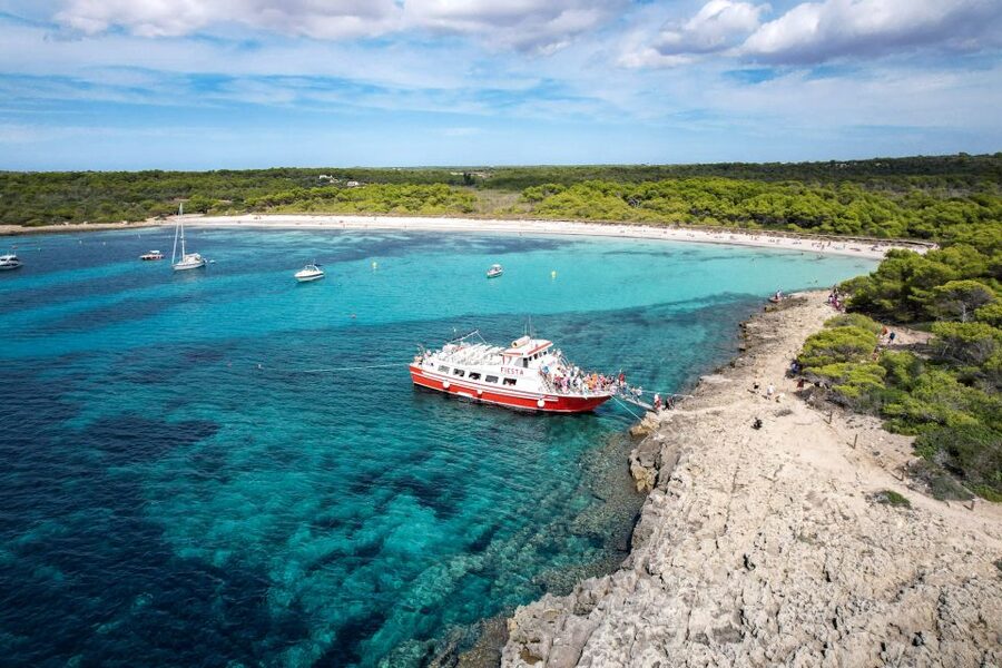 Menorca: Full-Day Boat Tour with Paella Lunch - Paella on board, with a clear dietary warning