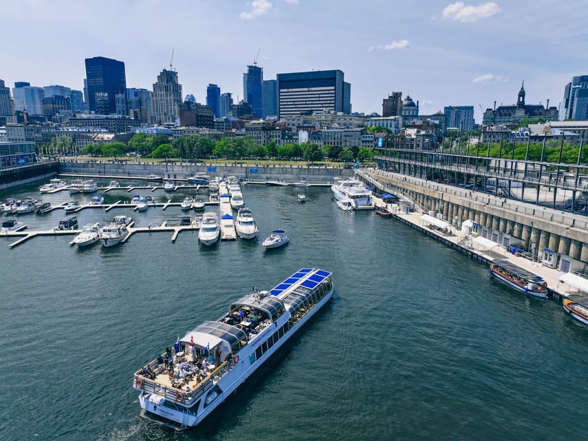Montreal: Le Bateau-Mouche St. Lawrence Sightseeing Cruise - Weather, timing, and the sound of the guide