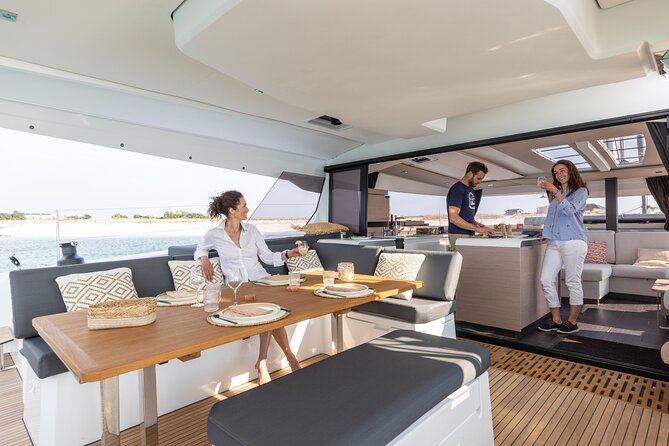 Mykonos: Brand-New Catamaran Cruise with Meal, Drinks & Transport - Lunch, drinks, and the onboard atmosphere