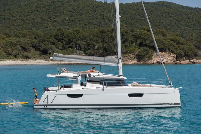 Mykonos: Brand-New Catamaran Cruise with Meal, Drinks & Transport - A possible view of Delos, not a full archaeological visit