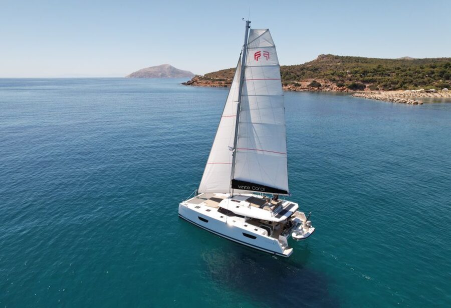 Mykonos: Catamaran Cruise with 3-Course Meal and Transfers - Rhenia, Delos, or the southern coast