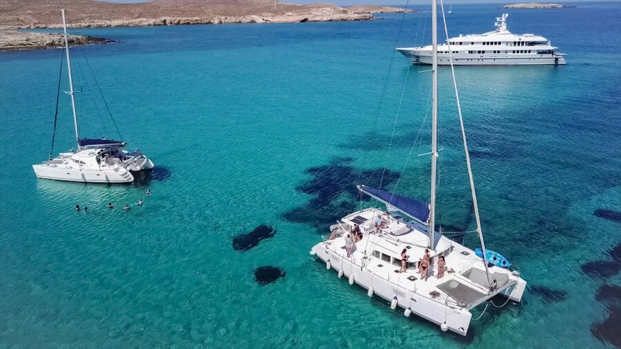 Mykonos: Catamaran Cruise with Lunch, Drinks and Transfer - Rhenia’s clear water and two-hour pause
