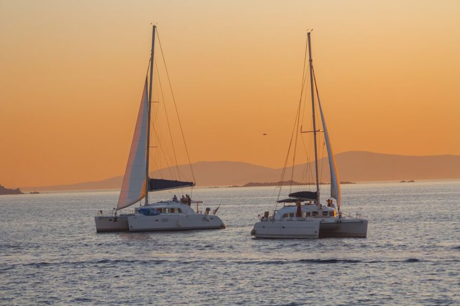 Mykonos: Catamaran Cruise with Lunch, Drinks and Transfer - Greek lunch served onboard