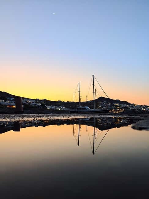 Mykonos: Sunset Boat Cruise with Light Dinner & Drinks - Dinner arrives as the light changes