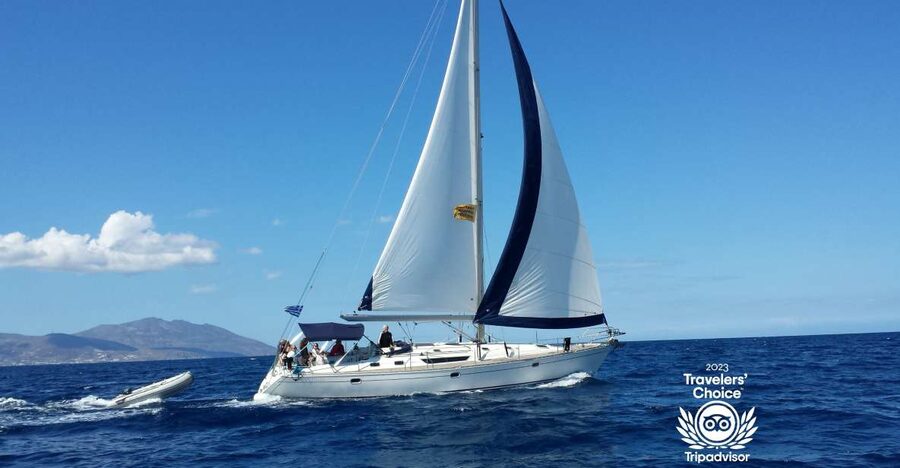 Mykonos: Yacht Cruise to Rhenia and Guided Tour of Delos - Rhenia: clear water and a quiet bay