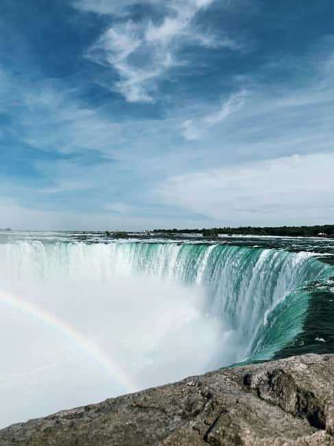 Niagara Falls Day Tour with Boat Ride & Journey Behind Falls - Journey Behind the Falls shows the water from inside the rock