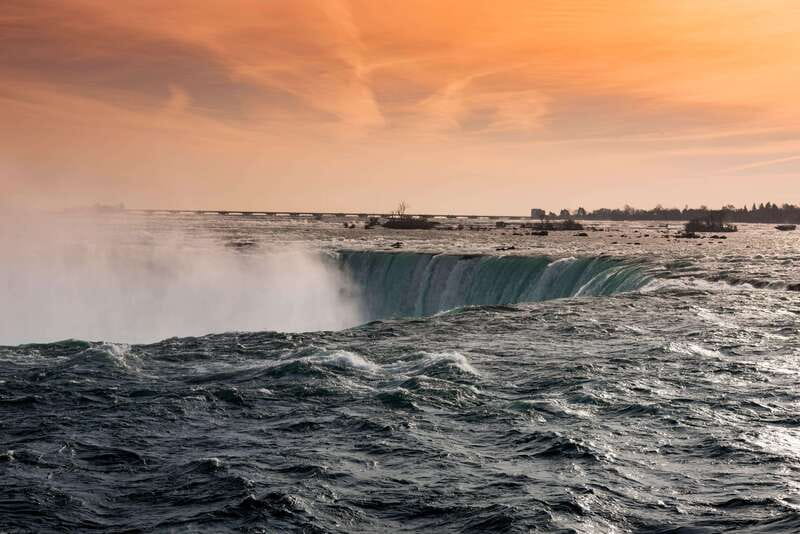 Niagara Falls Day Tour with Boat Ride & Journey Behind Falls - Maple Leaf Place adds a small local-food stop