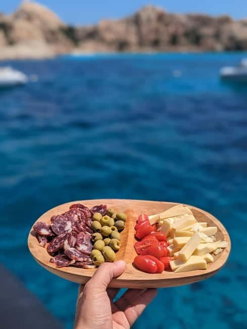 Olbia: Dolphin Watching & Snorkeling Boat Trip - Cala Moresca, Cala Greca, and the swim stop