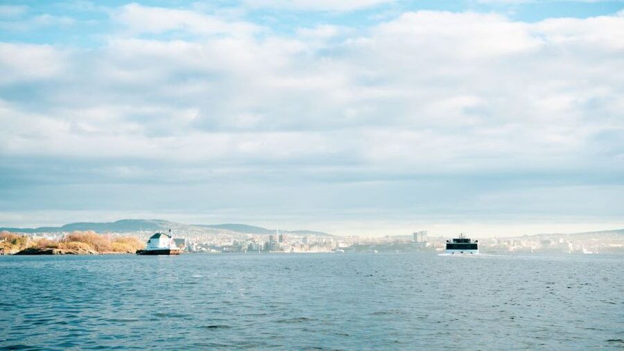 Oslo: Scenic Fjord Cruise with Audio Guide Commentary - Returning past Sørenga and the Opera House