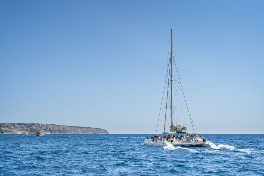 Palma de Mallorca: 5-Hour Catamaran Cruise with Lunch & Swim - Leaving Palma with harbor views