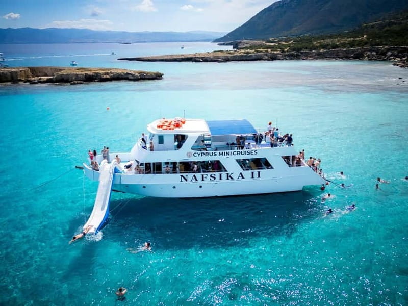 Paphos/Akamas: Blue Lagoon Bus & Boat Tour with Water Slide - Swimming at the Blue Lagoon