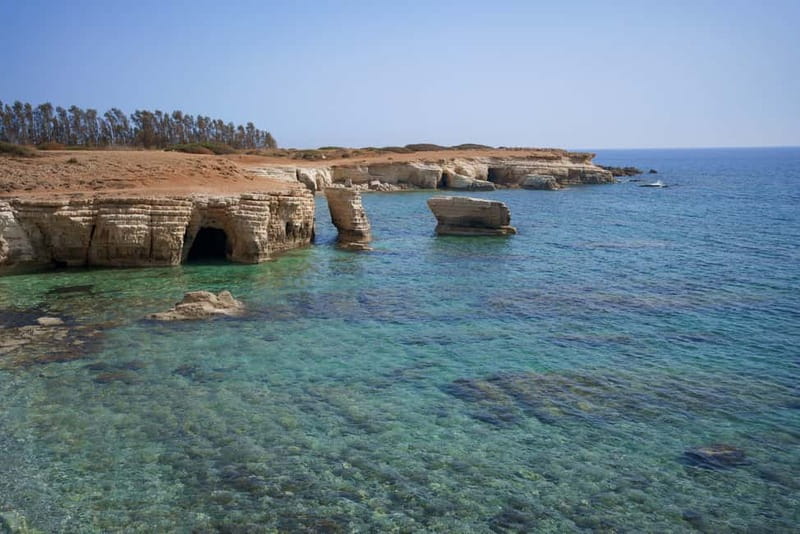 Paphos/Akamas: Blue Lagoon Bus & Boat Tour with Water Slide - Sea caves, banana plantations, and the Edro III shipwreck