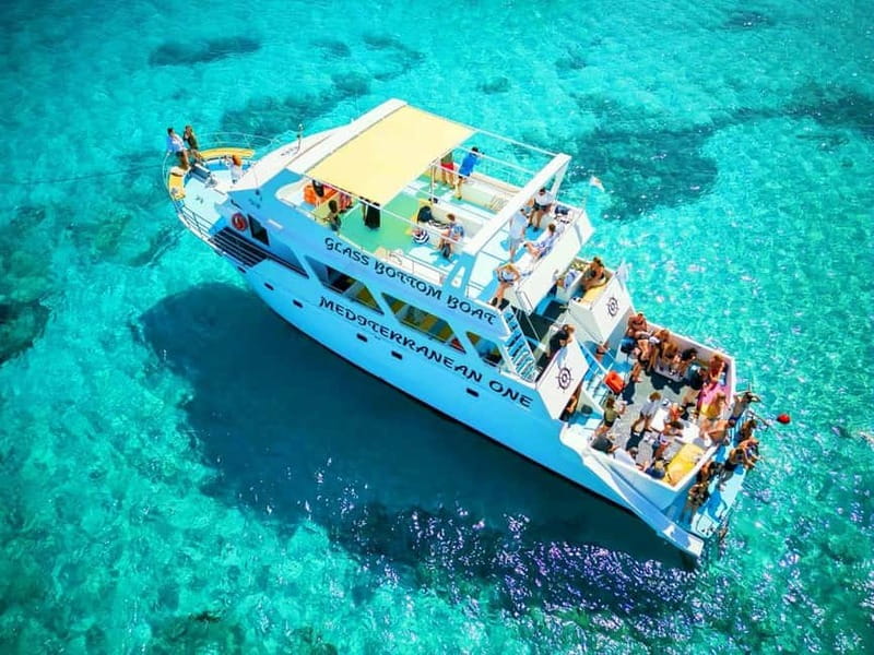 Paphos: Blue Lagoon Boat Adventure with Bus Transfer - Wine, fruit, and the ride back