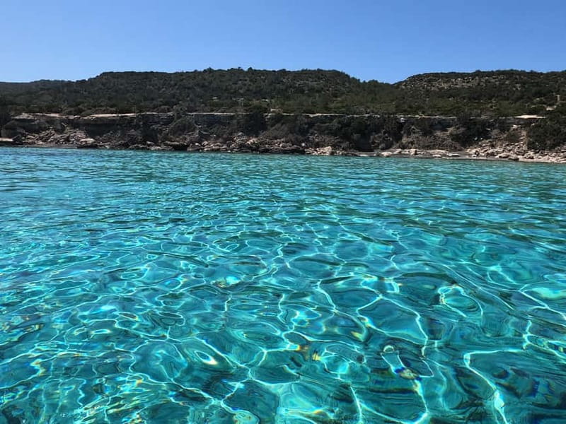 Paphos Blue Lagoon Cruise: Slide, Music & Hotel Transfer - Food, drinks, music, and comfort on board