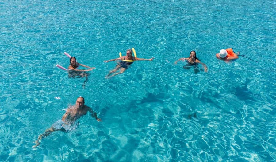 Paphos Blue Lagoon Cruise: Slide, Music & Hotel Transfer - Boarding at Latchi Harbour