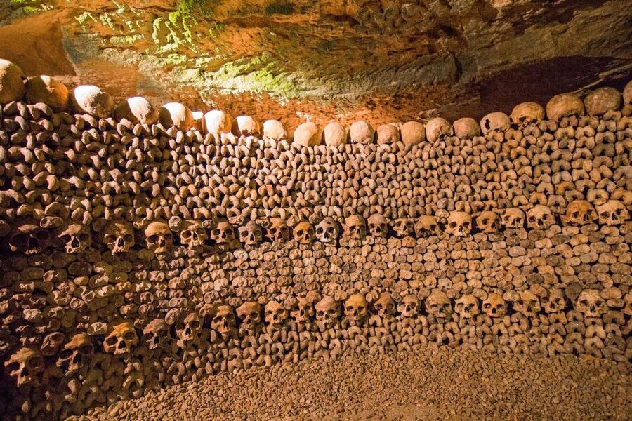 Paris: Catacombs Entry & Seine River Cruise with Audio Guide - Walking beside the bones of Paris