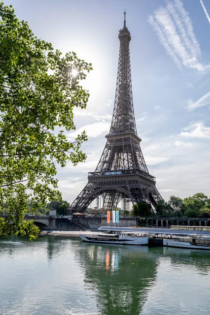 Paris: Seine River Cruise with Champagne from Eiffel Tower - Champagne, seating, and the onboard setup