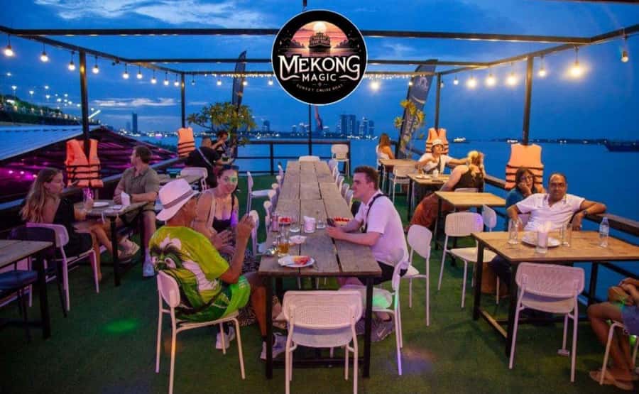 Phnom Penh: Sunset Cruise with Unlimited Beers & BBQ Buffet - Boarding the boat and choosing your package
