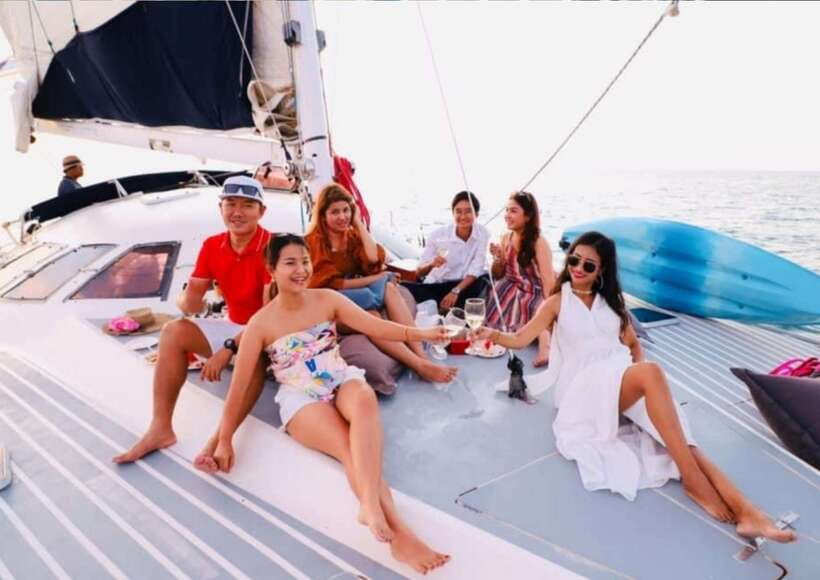Phuket: Coral Island Catamaran Cruise with Sunset Dinner - Beach time at Koh Hey, plus paid water sports