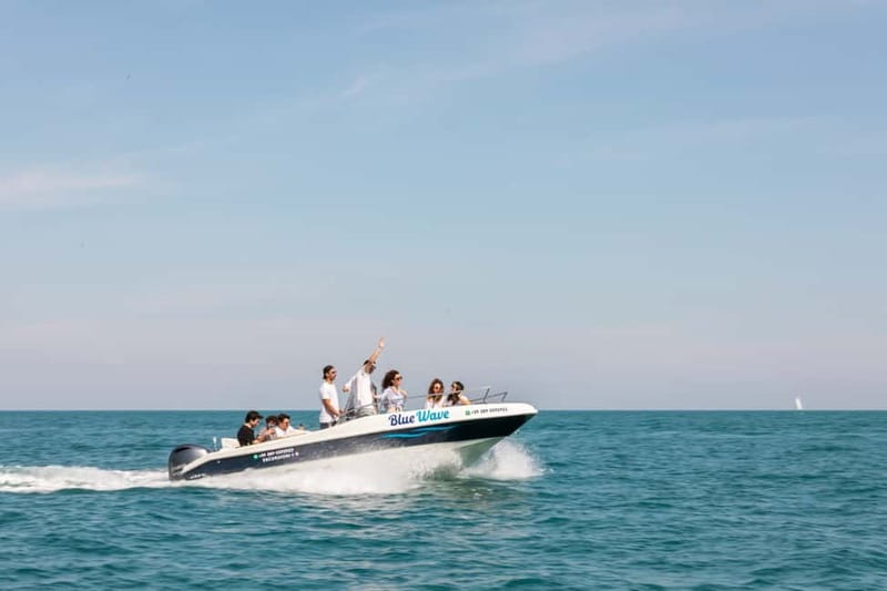 Polignano a Mare: Boat Tour with Prosecco and Snacks - Grotta Palazzese and the first caves