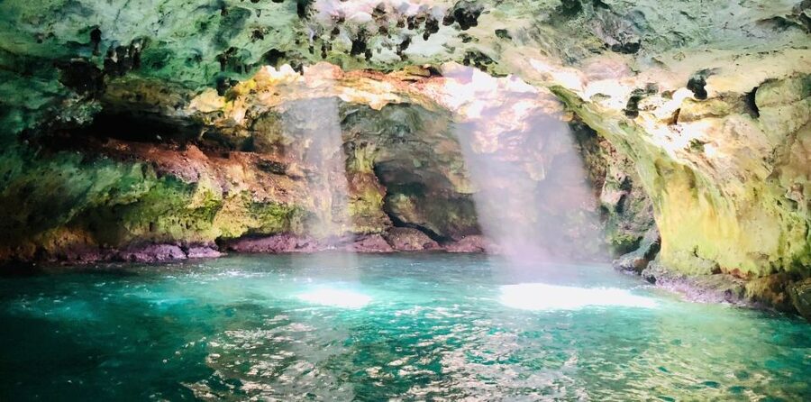 Polignano a Mare: Boat Trip, Swim & Cave with Aperitif - Polignano’s landmarks from below