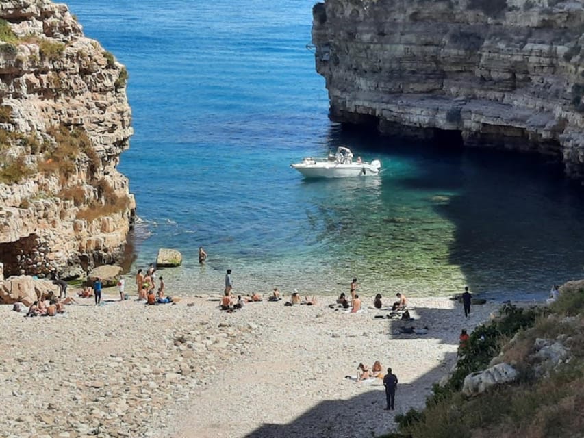 Polignano's coast and caves: a boat tour with drinks, swimming, music, and fun - The sheltered cove: swimming, snorkeling, and refreshments