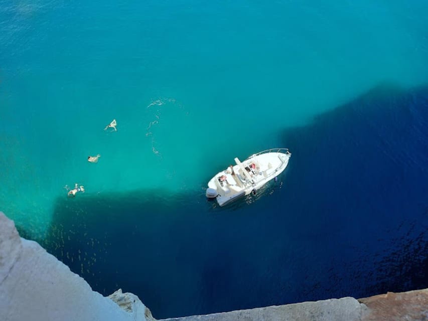 Polignano's coast and caves: a boat tour with drinks, swimming, music, and fun - Music, languages, and the tone on board