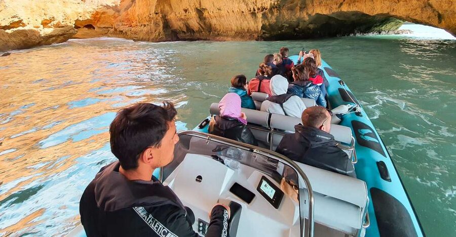 Portimão: Benagil Cave and Praia de Marinha Boat Tour - Setting out past Portimão and Ferragudo