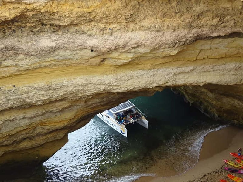 Portimão: Benagil Caves & Golden Coast Eco Catamaran Tour - Carvoeiro from the water