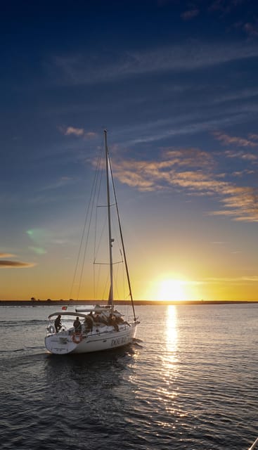 Porto: Charming Sailboat Cruise with Port Wine,Sunset Option - Port wine, snacks, and the onboard atmosphere