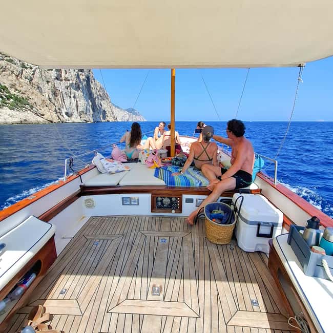 Porto San Paolo: Half Day Boat Tour to Tavolara and Molara - Spiaggia del Dottore: an early swim in clear water