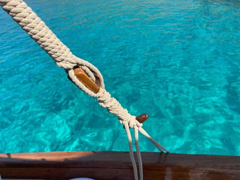 PortoS.Paolo: Half Day Traditional Boat Tour Tavolara Molara - Snacks, music, and a prosecco toast
