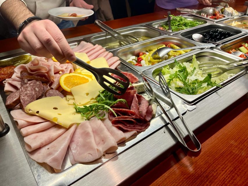 Prague: Sightseeing Boat Cruise with Buffet Dinner - Prague Castle after dark