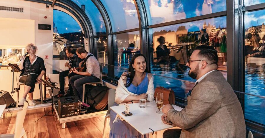 Prague: Sightseeing Dinner Cruise on Open-Top Glass Boat - Glass walls, open decks, and the best places to look