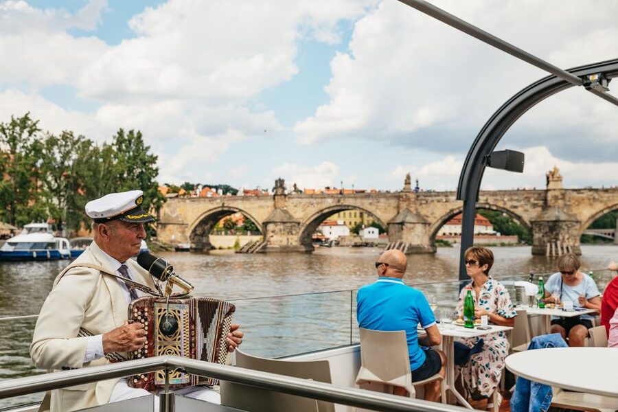 Prague: Vltava River Lunch Cruise in an Open-Top Glass Boat - Dancing House, Vyšehrad, and the farther riverfront